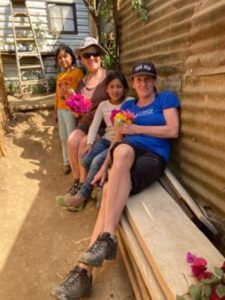 FHTH staff posing for a photo with Guatemalans