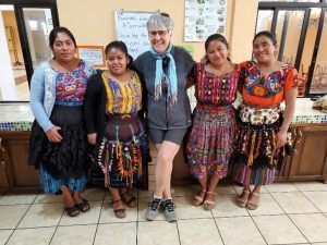 FHTH staff posing for a photo with Guatemalans