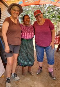 FHTH staff posing for a photo with Guatemalans